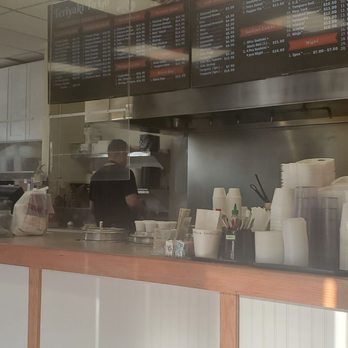 Teriyaki To Go - a man standing behind a counter - Japanese Near Me - Citrus Heights, California Teriyaki To Go - a man standing behind a counter - Japanese Near Me - Citrus Heights, California