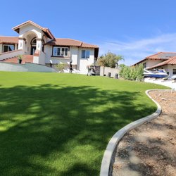 Hyperion Synthetic Turf and Landscaping - We transformed this yard with flawless artificial turf--vibrant green, curved edges, and a clean, modern space ready to enjoy.