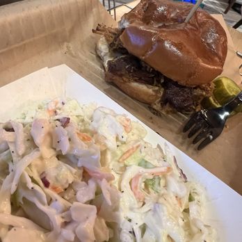Neon Pig - Pulled pork sandwich and coleslaw - Barbeque Near Me - Thackerville, Oklahoma Neon Pig - Pulled pork sandwich and coleslaw - Barbeque Near Me - Thackerville, Oklahoma