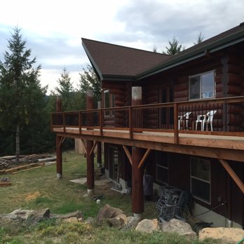 3SK Construction - Cedar railing with aluminum balusters and trex top cap. - General Contractors Near Me