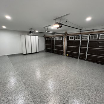 Cal Jackson Construction - a garage with a lot of storage space - Painters Near Me