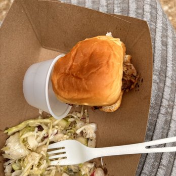Salt + Smoke - Pulled pork sandwich with a side of coleslaw. - Bars Near Me - Saint Louis, Missouri Salt + Smoke - Pulled pork sandwich with a side of coleslaw. - Bars Near Me - Saint Louis, Missouri