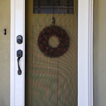 Den Defenders - Security screen door with programmable lock - Chimney Sweeps Near Me Den Defenders - Security screen door with programmable lock - Chimney Sweeps Near Me