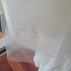 Straight pins left in my wedding dress that stabbed me as I was getting dressed.