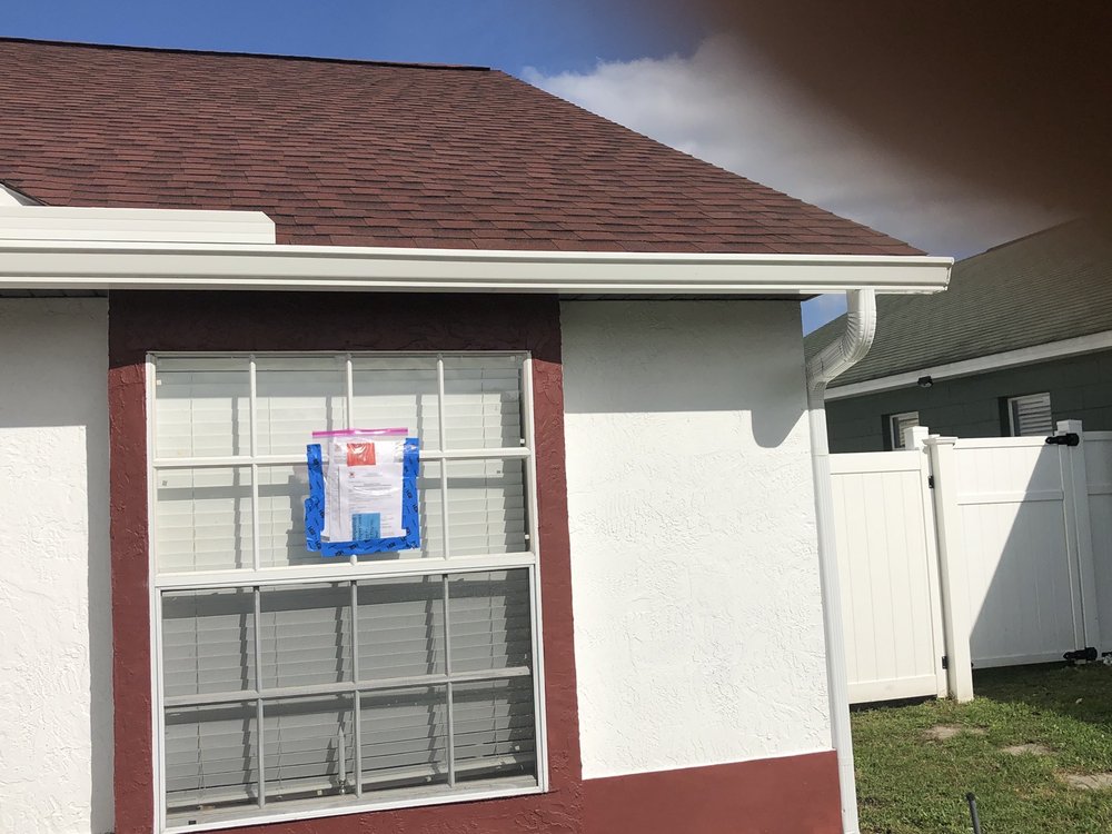 Slide of Tadlock Roofing