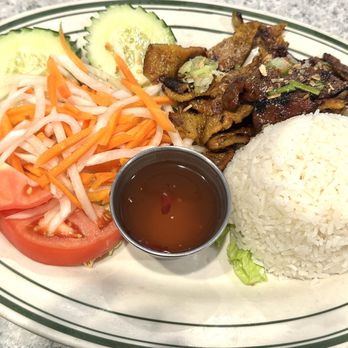 Pho Saigon - Sliced pork platter. Another version of Vietnamese pork chop. Since there is no bones inside, it is easy to eat. - Vietnamese Near Me - Hackensack, New Jersey