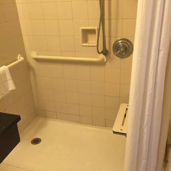 Hilton Atlanta - Accessible shower with mold/dirty tile - Hotels Near Me - Atlanta, Georgia Hilton Atlanta - Accessible shower with mold/dirty tile - Hotels Near Me - Atlanta, Georgia