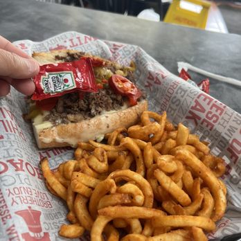 The Cheese Steak Shop - Small Philly cheesesteak with curly fries - Sandwiches Near Me - Pleasanton, California The Cheese Steak Shop - Small Philly cheesesteak with curly fries - Sandwiches Near Me - Pleasanton, California