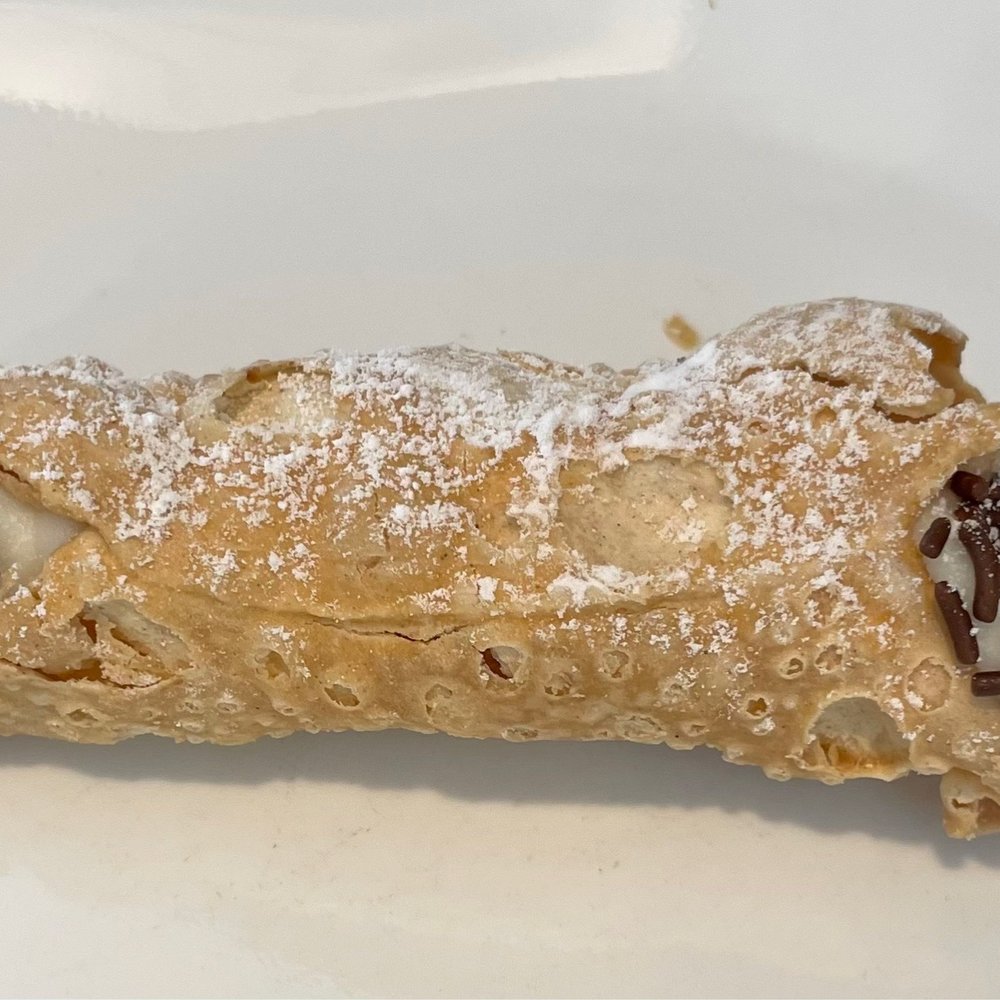Cannoli with sprinkles, which I thought were chocolate chips. I've ever seen a cannoli with sprinkles.