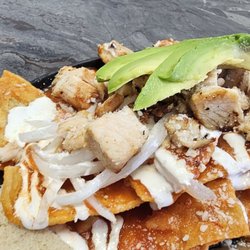 El Rincon La Chulis - Red chilaquiles with chicken.