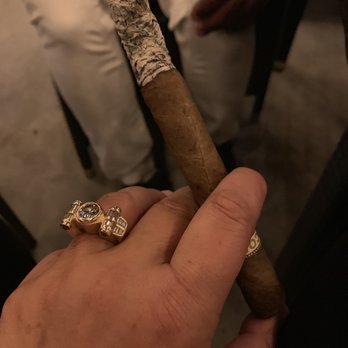 Torch Cigar Bar - Working on my long ash - Lounges Near Me - Phoenix, Arizona Torch Cigar Bar - Working on my long ash - Lounges Near Me - Phoenix, Arizona