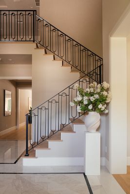 Simple Elegance - Our interior design team has been tasked with creating a chic and contemporary living space that is modern and sophisticated. The design feature a light and neutral color palette with black accents for a sleek and minimalist look. We incorporate wood elements throughout the space for warmth and texture.