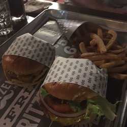 Fritzenberger - Our burgers , the Fish Burger and the Pulled Porky Burger, with a side green pickles .