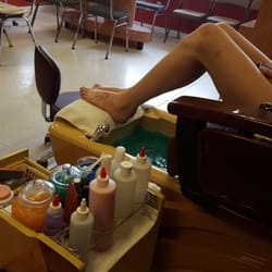 T J Nails - Sitting waiting for her to rush through mine to get to her ... rediculous