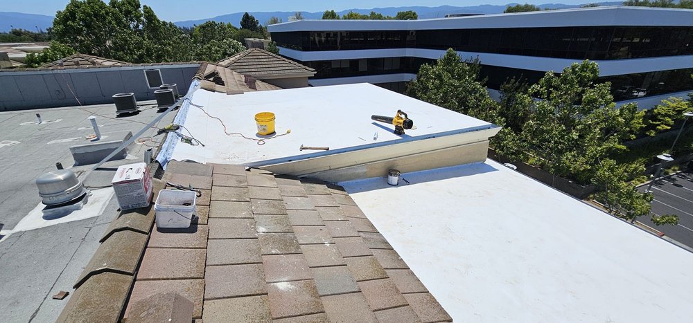 Slide of J&V Roofing Service