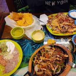 a table full of mexican food a table full of mexican food