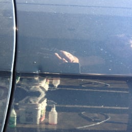 Nasty dent right on the body line.