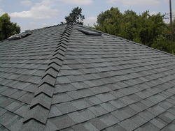 Slide of Dutchmark Roofing