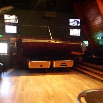 The Cooler Restaurant & Bar - Folding stage over the pool tables - Sports Bars Near Me - Eugene, Oregon