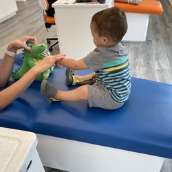 Alpine Kids Dentistry - Brushing Dino's teeth, getting my little guy ready for his cleaning.