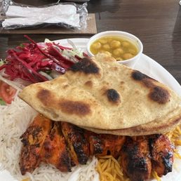 Beef & Chicken Tikka Combo and across was Chicken Koobideh. YOU MUST have their Curry Chickpeas! Delicious. Beef & Chicken Tikka Combo and across was Chicken Koobideh. YOU MUST have their Curry Chickpeas! Delicious.