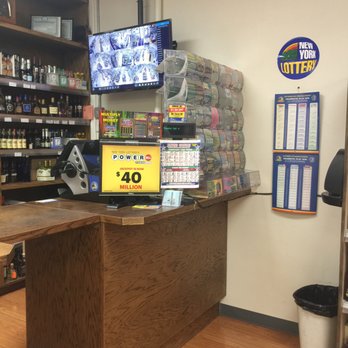 Jericho Liquor - the front desk of a liquor store - Beer, Wine & Spirits Near Me - Mineola, New York