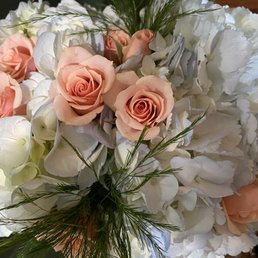 Blue hydrangeas and baby roses. Blue hydrangeas and baby roses.