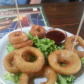 Old Wild West - Onion Ring appetizer.  8 rings for €5 with real BBQ sauce. - Burgers Near Me - Milan, Michigan