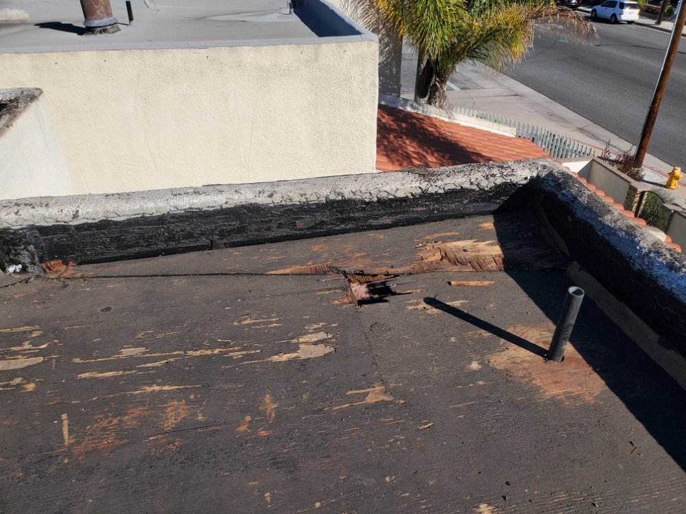 Slide of Berber-Bravo Roofing