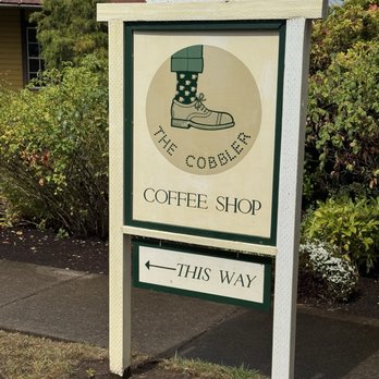 The Cobbler - Signage from Main Street sidewalk - Coffee & Tea Near Me - Aurora, Oregon The Cobbler - Signage from Main Street sidewalk - Coffee & Tea Near Me - Aurora, Oregon