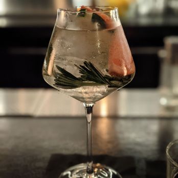 Tender Mercy - House G&T-gin blend (aviation + bombay sapphire), elderflower, fleur de sel, tonic, garnish salad - Cocktail Bars Near Me - Dayton, Ohio Tender Mercy - House G&T-gin blend (aviation + bombay sapphire), elderflower, fleur de sel, tonic, garnish salad - Cocktail Bars Near Me - Dayton, Ohio