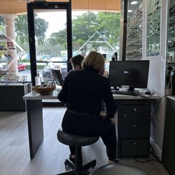 Royal Palm Optical - Opticians working hard