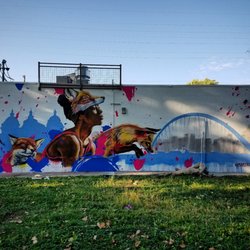 Shop N Save - Mural by miami artist nate dee on the side of shop n save