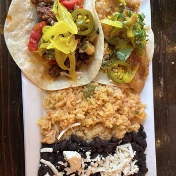 Cantina Louie - Two tacos with rice and beans. - Mexican Near Me - Fernandina Beach, Florida Cantina Louie - Two tacos with rice and beans. - Mexican Near Me - Fernandina Beach, Florida
