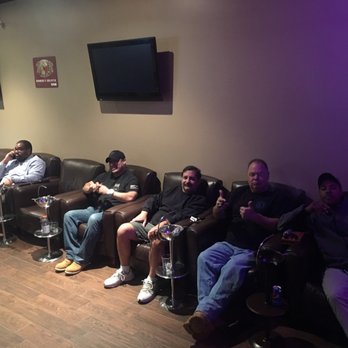 Carlito’s Cigars - a group of men sitting in a waiting room - Tobacco Shops Near Me - Middletown, New York