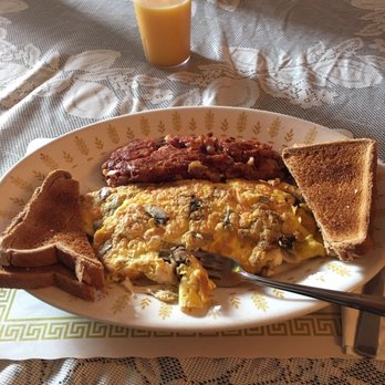 Cabreras Pizzeria & Restaurant - A mushroom, provolone omelette with a side of corned beef has accompanied by some whole wheat toast. Glass of oj to wash it all down. - Pizza Near Me - Lansford, Pennsylvania Cabreras Pizzeria & Restaurant - A mushroom, provolone omelette with a side of corned beef has accompanied by some whole wheat toast. Glass of oj to wash it all down. - Pizza Near Me - Lansford, Pennsylvania