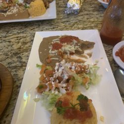 Hidalgo Bar and Grill - Side dishes... rice, pico de gallo, and refried beans