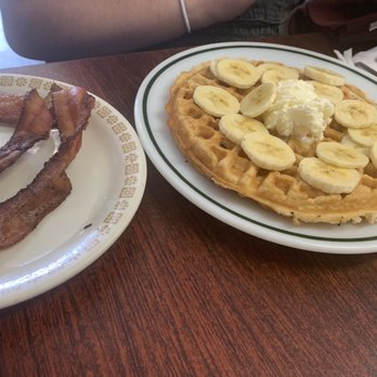Cafe McBryde - Fluffy waffle loaded with bananas, and a side of bacon. - Breakfast & Brunch Near Me - Richmond, California
