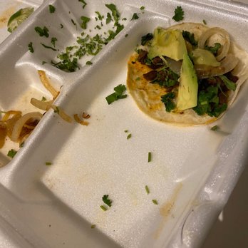 Taqueria Morelia - a plastic tray with a taco on it - Mexican Near Me - Richmond, Texas Taqueria Morelia - a plastic tray with a taco on it - Mexican Near Me - Richmond, Texas