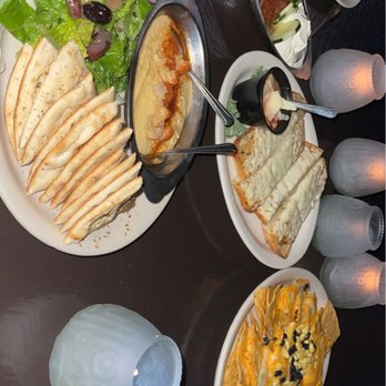 The Caves - Appetizers: Hummus Plate, Bread Sticks, Nachoes - Coffee & Tea Near Me - Edgewater, New Jersey The Caves - Appetizers: Hummus Plate, Bread Sticks, Nachoes - Coffee & Tea Near Me - Edgewater, New Jersey