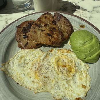 Nova’s Breakfast & Brunch - Chirp n Chop - pork chops seasoned mild with a side of avocado instead of hashbrowns - Breakfast & Brunch Near Me - Pineville, Louisiana