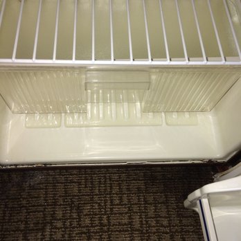 Quality Inn - 1980s fridge runs all night and has water pooled in the bottom of it. - Hotels Near Me - Greeneville, Tennessee