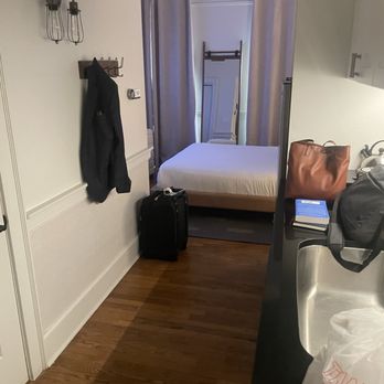 The Maverick, powered by Placemakr - The walkthrough is just enough space, shoulder to shoulder for two people to move. - Hotels Near Me - San Antonio, Texas