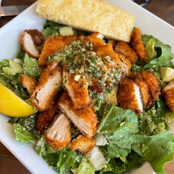Joe's Farm Grill - Chicken Caesar Salad (added the chicken tenders) - American Near Me - Gilbert, Arizona Joe's Farm Grill - Chicken Caesar Salad (added the chicken tenders) - American Near Me - Gilbert, Arizona