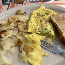 Western omelet, home fries and wheat toast