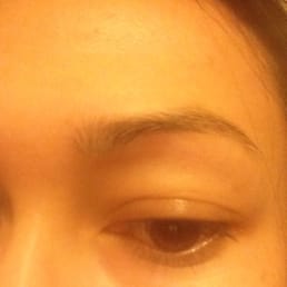 Weird shaped eyebrow. Layer of hair taken off from bottom. Weird shaped eyebrow. Layer of hair taken off from bottom.