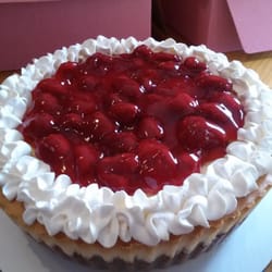 Everything Cheesecake - Ny Style topped with strawberries