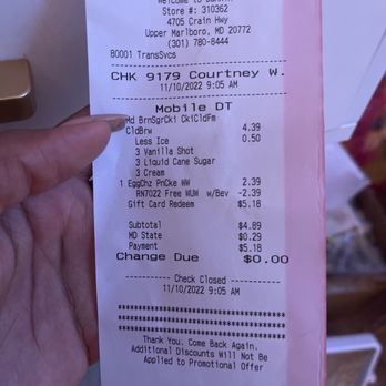 Dunkin' -  a person holding a receipt in their hand - Donuts Near Me - Upper Marlboro, Maryland
