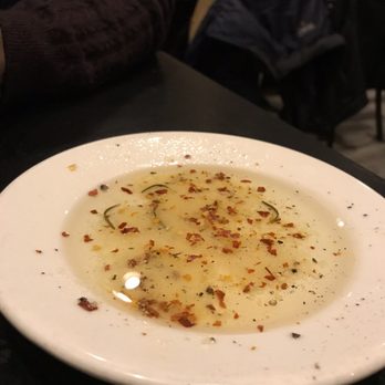 Osteria 166 - Oil concoction for the tasty bread. Some crushed red pepper that made it just a little different. - Italian Near Me - Buffalo, New York Osteria 166 - Oil concoction for the tasty bread. Some crushed red pepper that made it just a little different. - Italian Near Me - Buffalo, New York