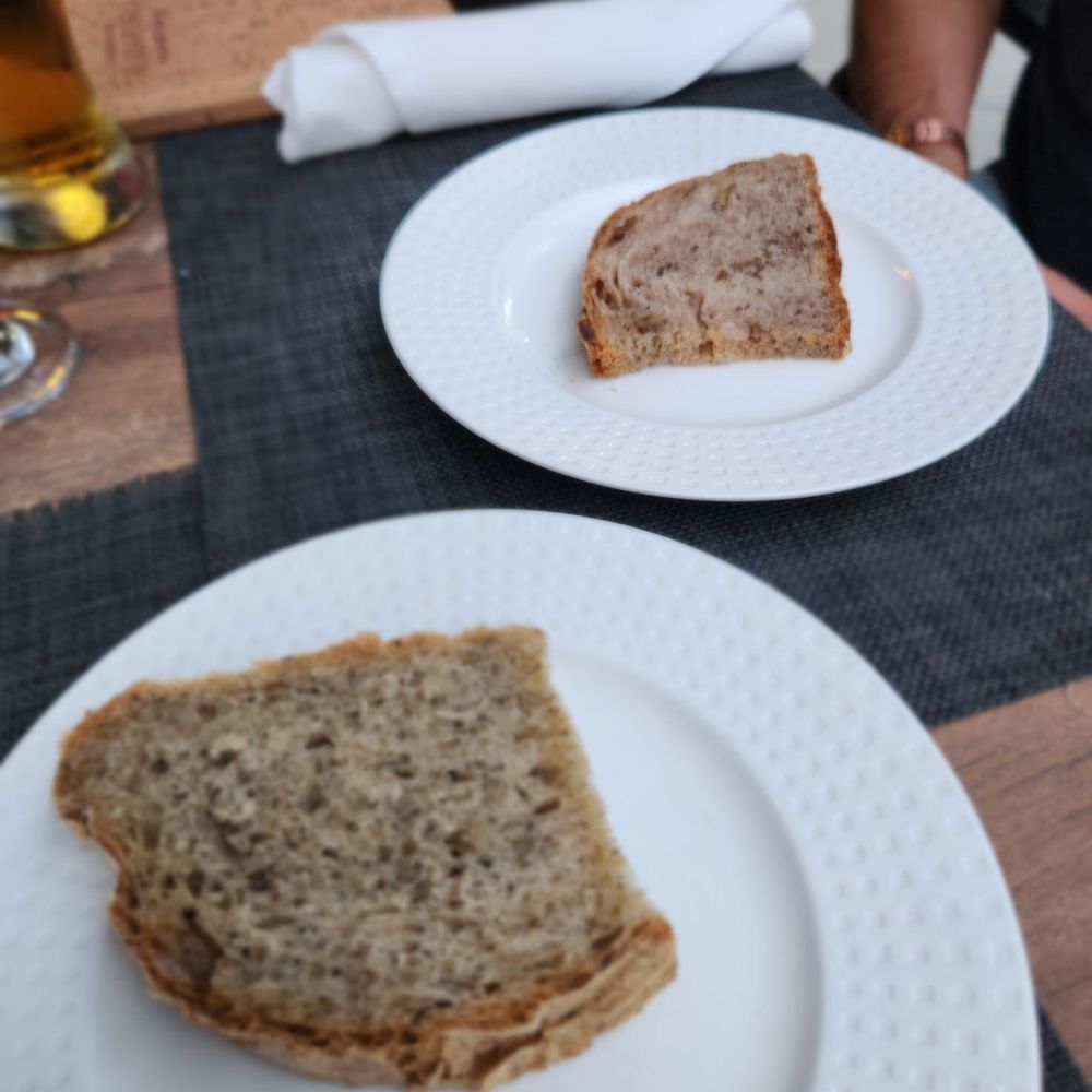 Taberna del Alabardero - Olive bread; Nutella and Raisen bread - Spanish Near Me - Washington, DC, District of Columbia Taberna del Alabardero - Olive bread; Nutella and Raisen bread - Spanish Near Me - Washington, DC, District of Columbia